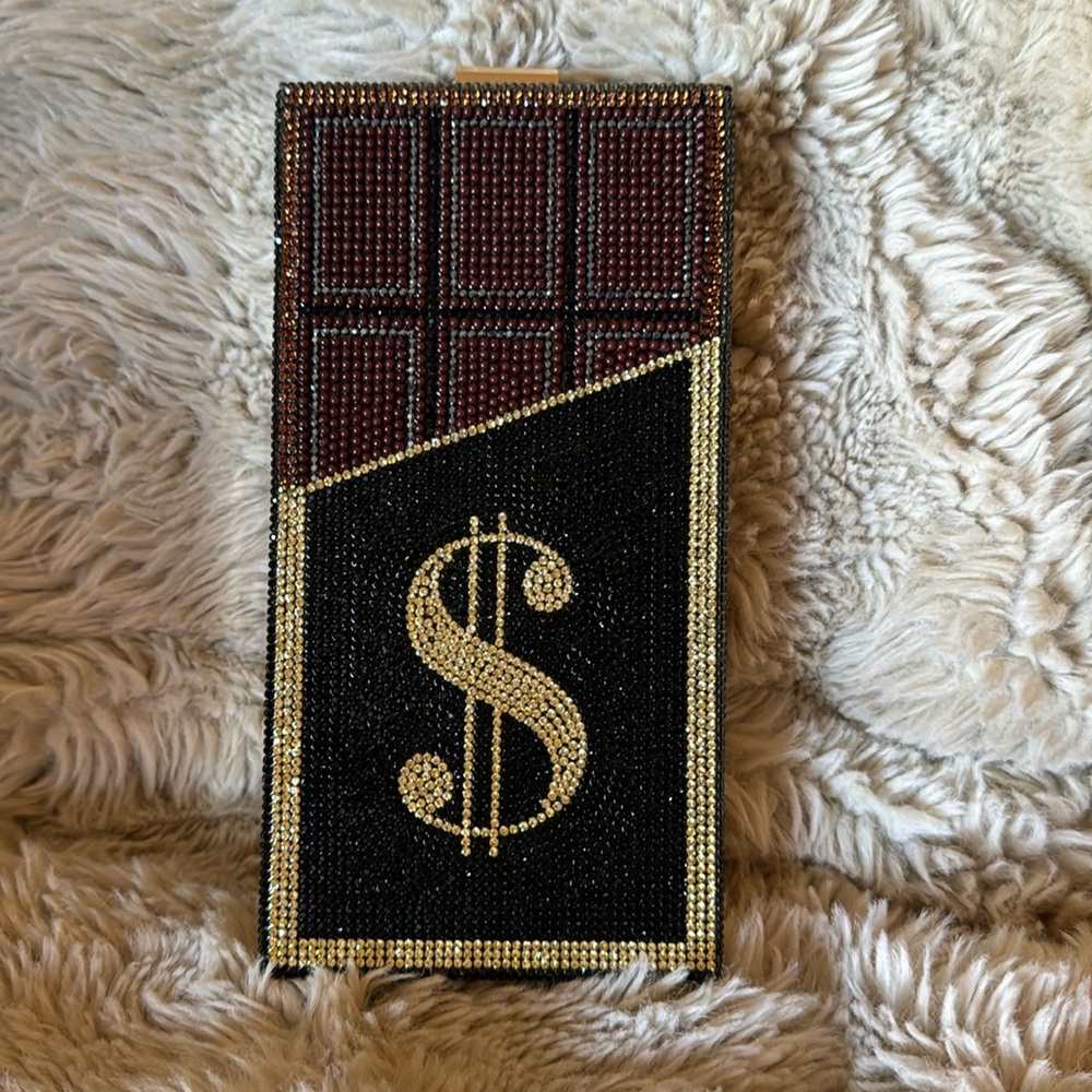 Blinged out chocolate bar clutch with a $ 2 chains original owner